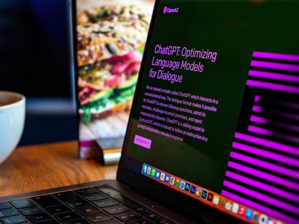 A laptop displaying information about ChatGPT and its models as data suggests predictions about how generative AI chatbots will transform work and boost productivity and the economy have failed to materialise so far.